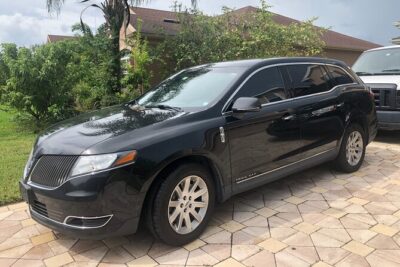 Orlando Airport MCO to Port Canaveral Luxury Sedan - Phone-On Rules and Driver Updates (This Actually Matters)