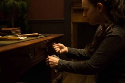 Sherlock Studies 75-Minute Escape Room - Inside the case: clues, secret passages, and code-cracking